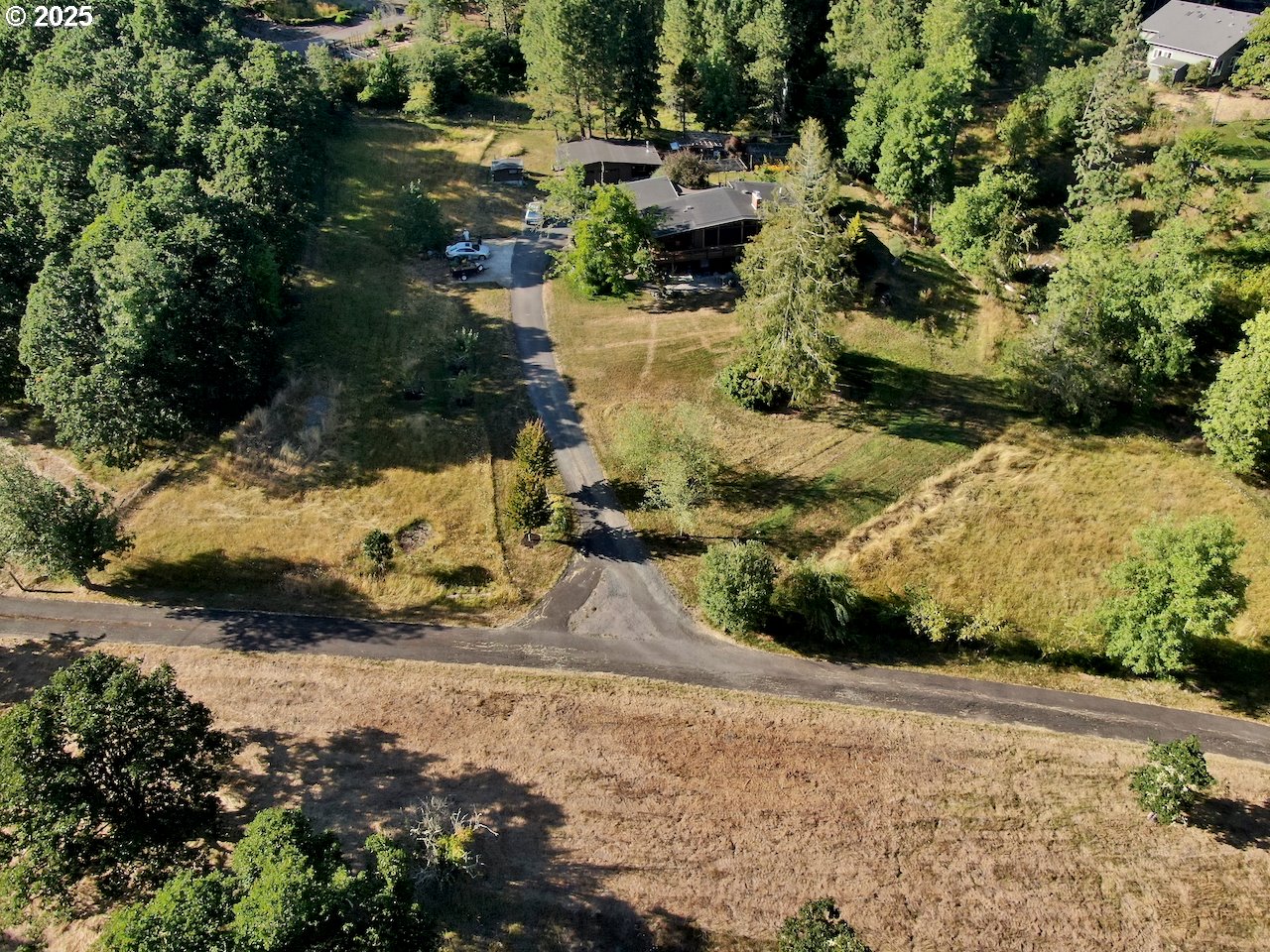 2203 Lorane Highway Eugene, OR 97405 - Photo 2 of 46 a view of a yard with plants and trees