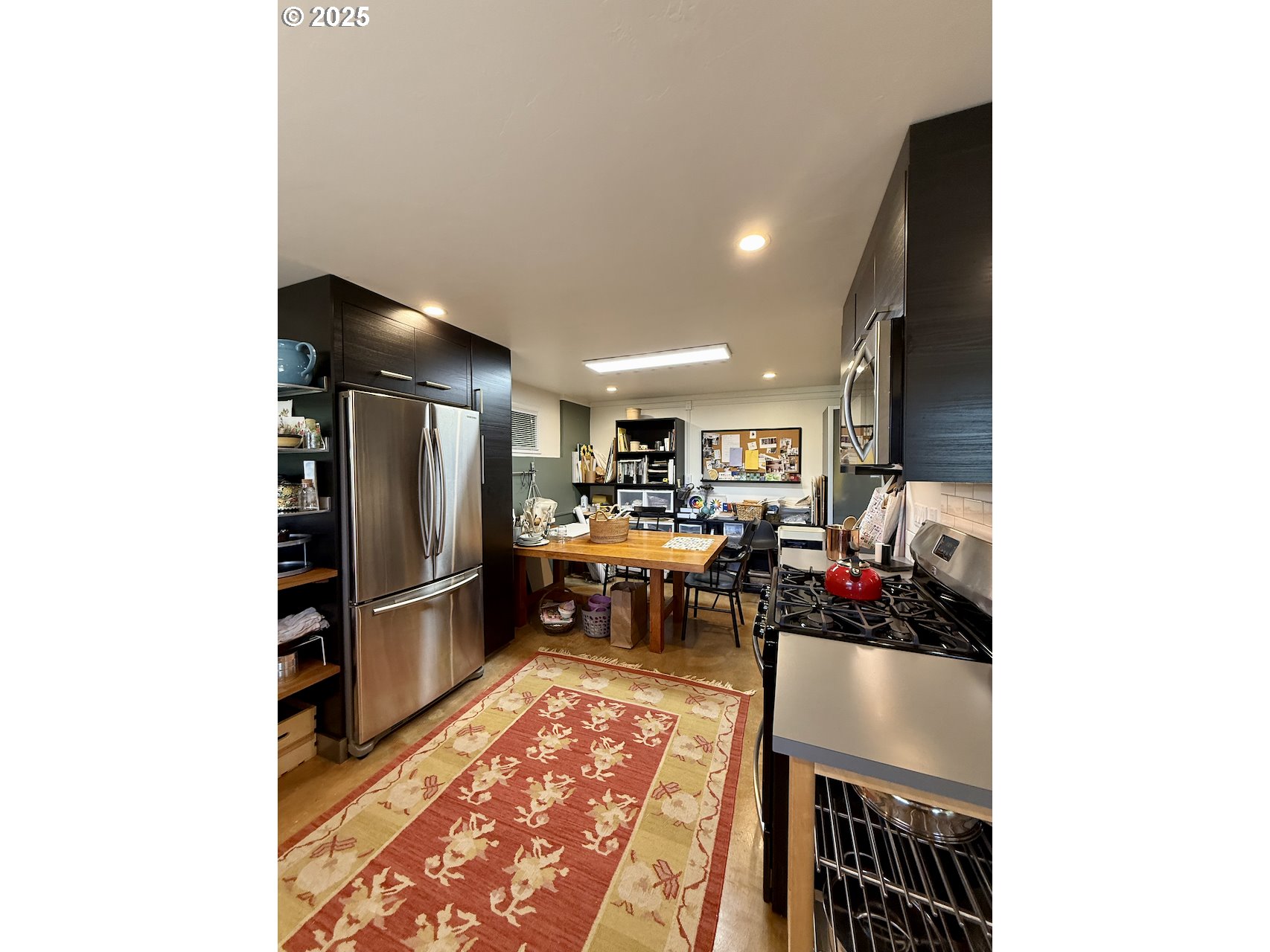 2203 Lorane Highway Eugene, OR 97405 - Photo 31 of 46 a living room with furniture and a flat screen tv