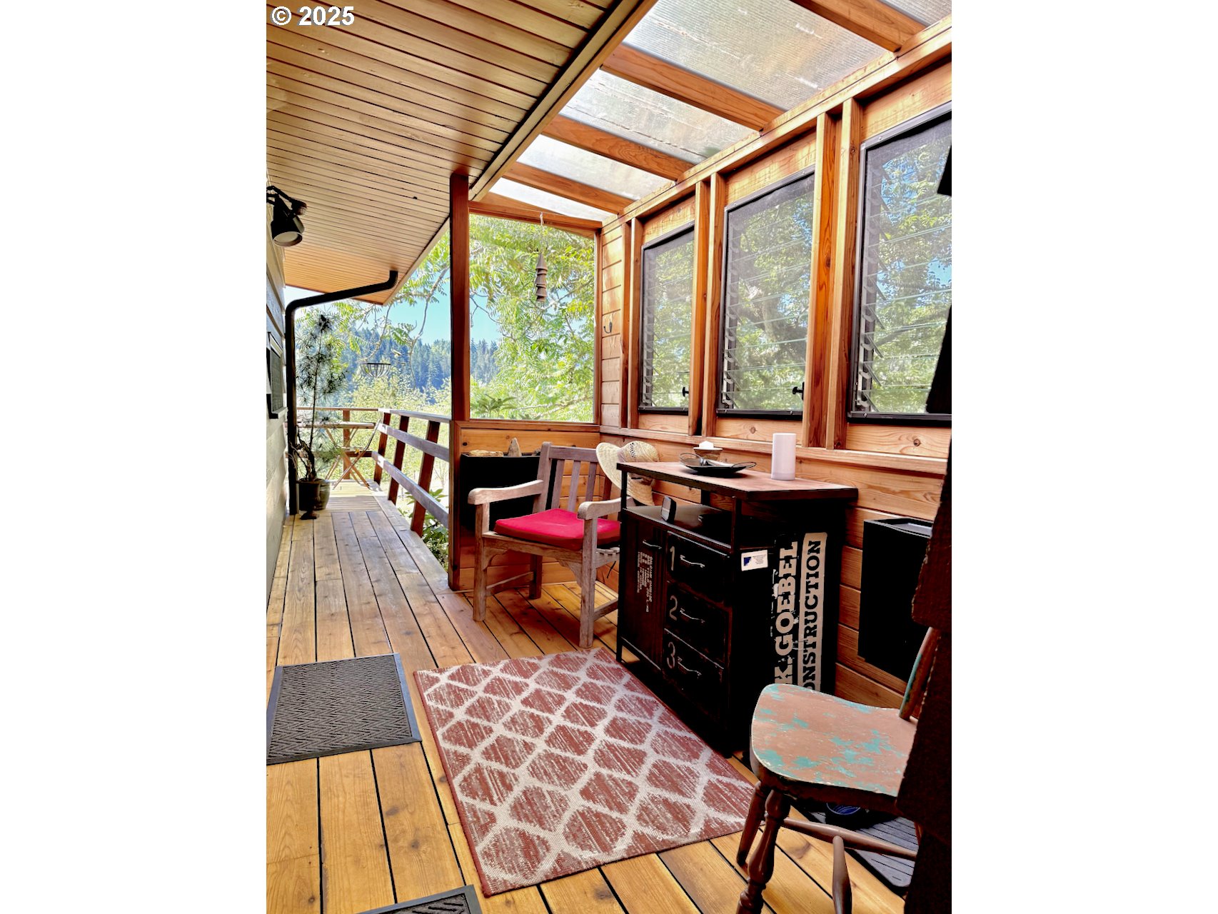 2203 Lorane Highway Eugene, OR 97405 - Photo 10 of 46 a room that has a table and a chair in it