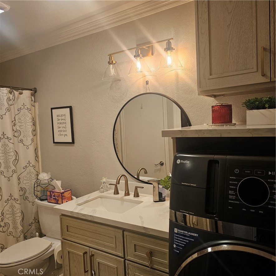 435 West 9th, Unit B3 Upland, CA 91786 - Photo 20 of 71 a bathroom with a sink and a mirror