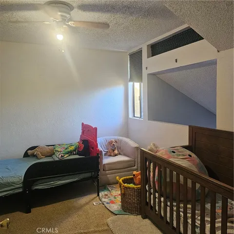 a view of a hallway with a window