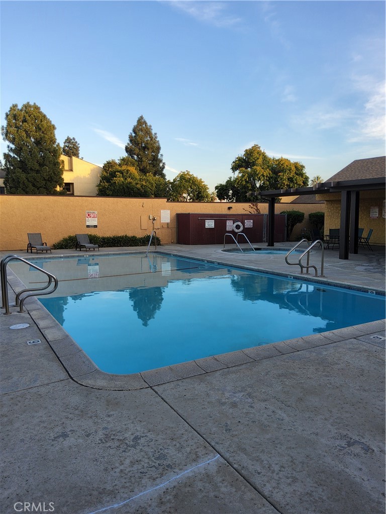 435 West 9th, Unit B3 Upland, CA 91786 - Photo 59 of 71 a view of a swimming pool with an outdoor seating
