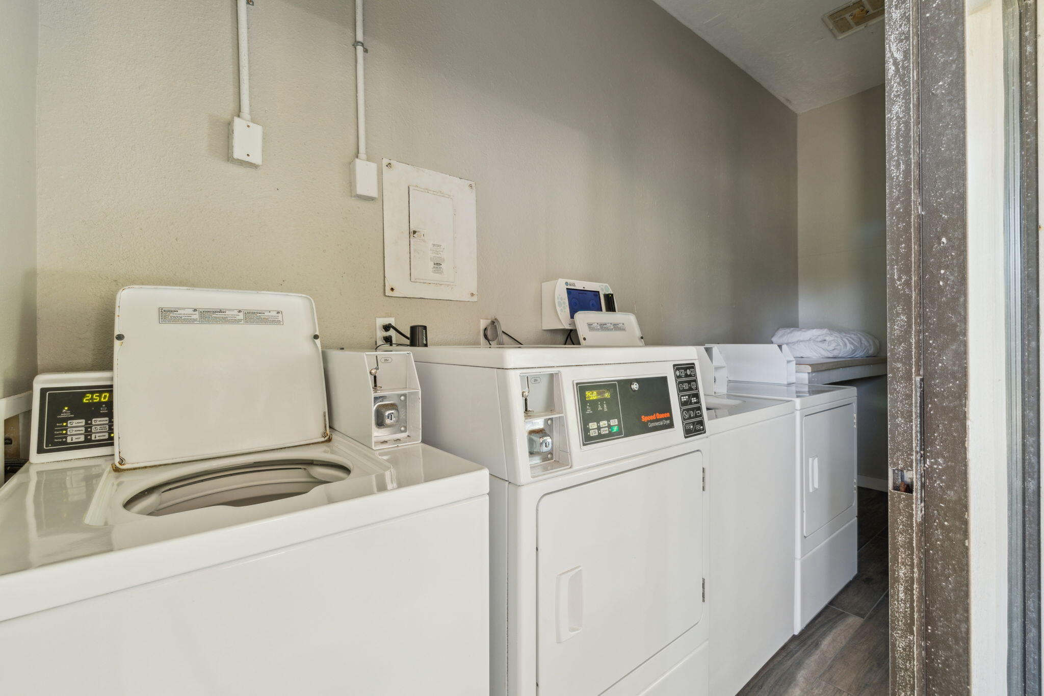 145 Beachfront Trail, Unit 102A Santa Rosa Beach, FL 32459 - Photo 29 of 33 a utility room with dryer and washer