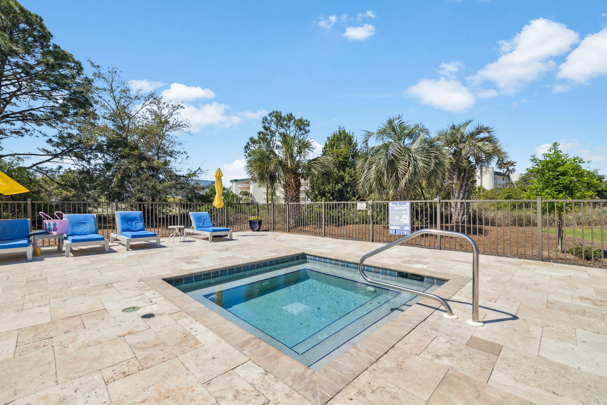 145 Beachfront Trail, Unit 102A Santa Rosa Beach, FL 32459 - Photo 30 of 33 a view of a swimming pool with a lounge chair