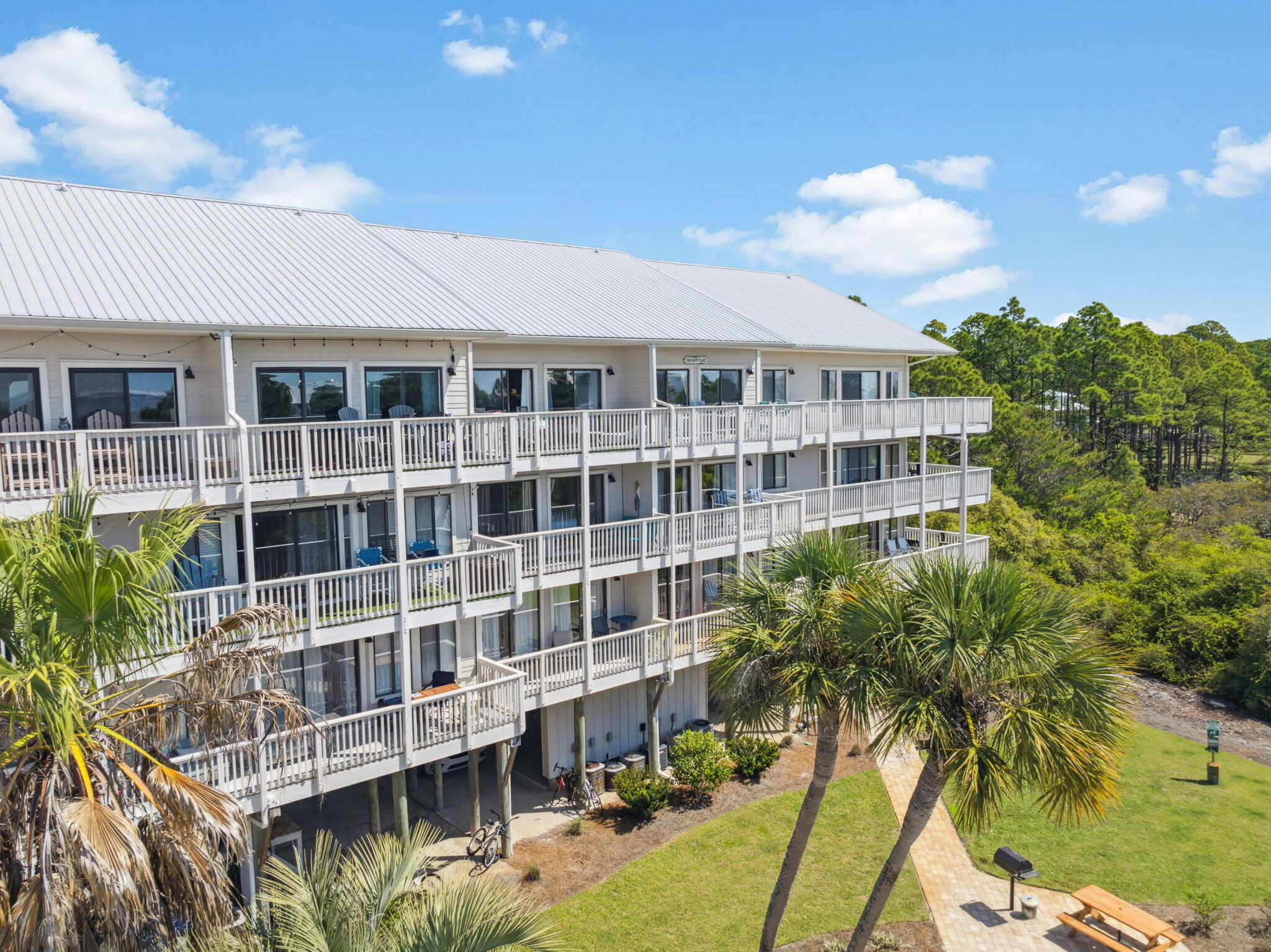 145 Beachfront Trail, Unit 102A Santa Rosa Beach, FL 32459 - Photo 3 of 33 a view of residential houses with yard and swimming pool