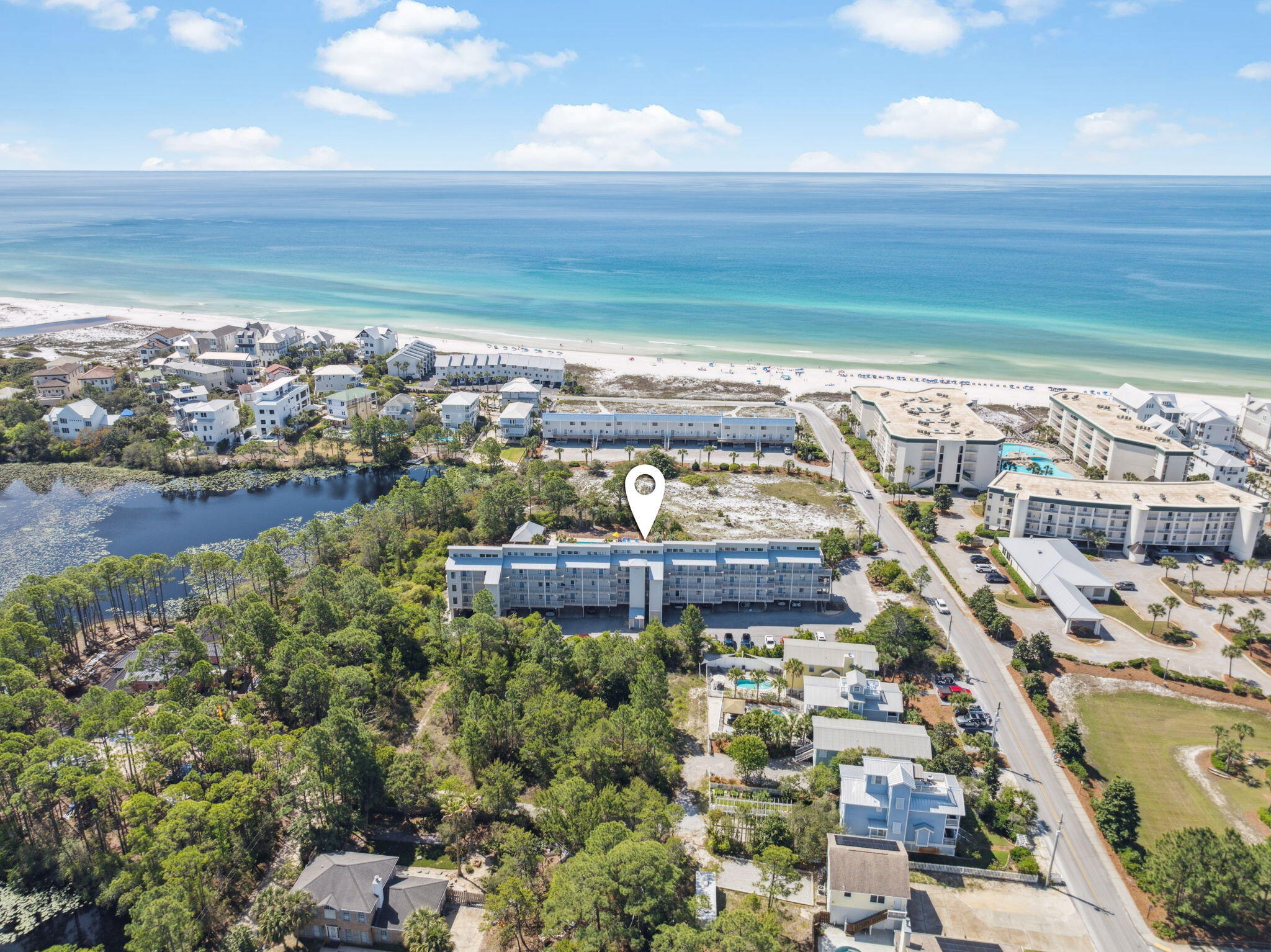 145 Beachfront Trail, Unit 102A Santa Rosa Beach, FL 32459 - Photo 4 of 33 a view of a city with an ocean view