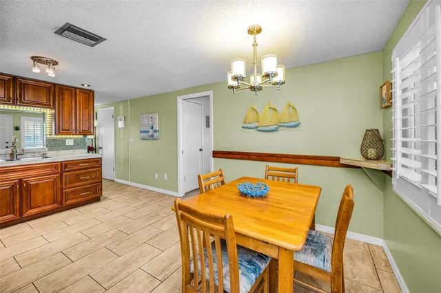 a room with furniture and a flat screen tv