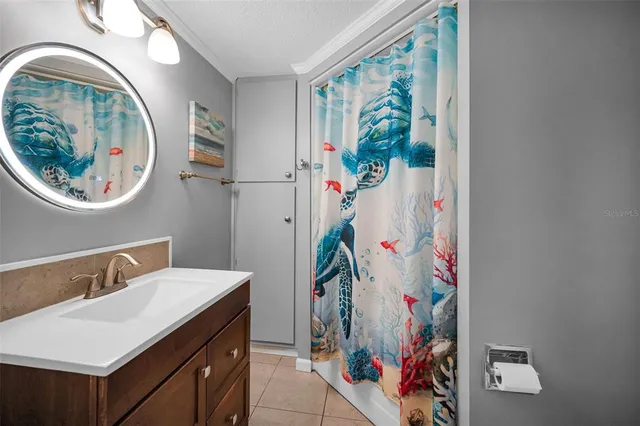 a backyard of a house with lots of green space and fountain