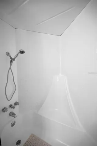 a view of a wrought iron fences in front of house