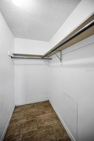 a view of statue in a garden