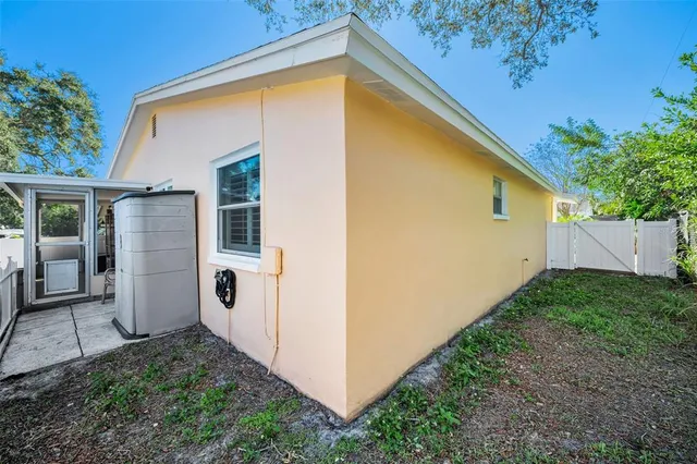 a dining room with furniture a rug and wooden floor