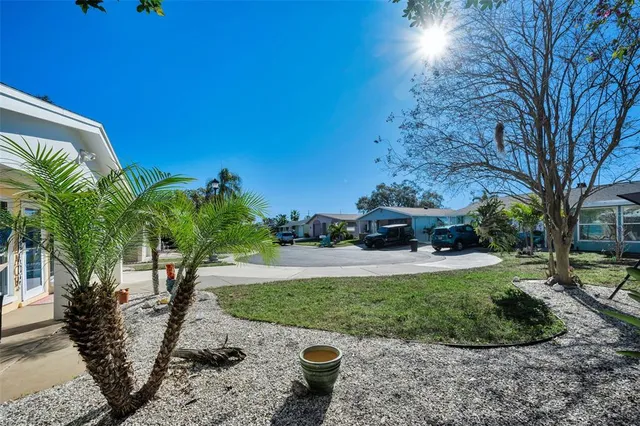 a view of a swimming pool with a patio