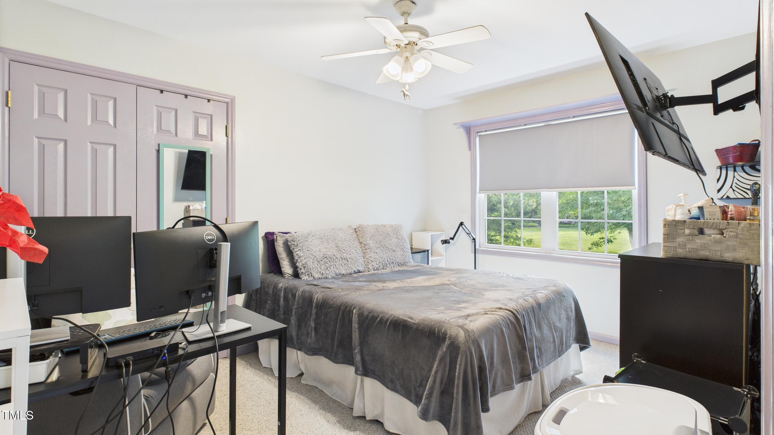 5309 Meadow Field Drive Mebane, NC 27302 - Photo 14 of 41 a bedroom with a bed and wooden floor