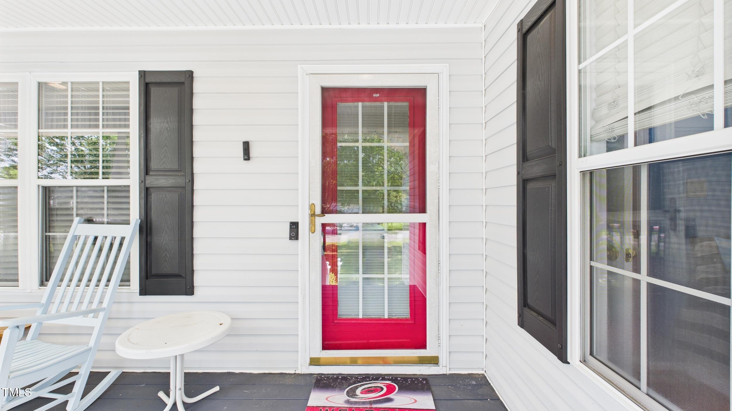 5309 Meadow Field Drive Mebane, NC 27302 - Photo 22 of 41 a view of a door of a house with a lounge chair