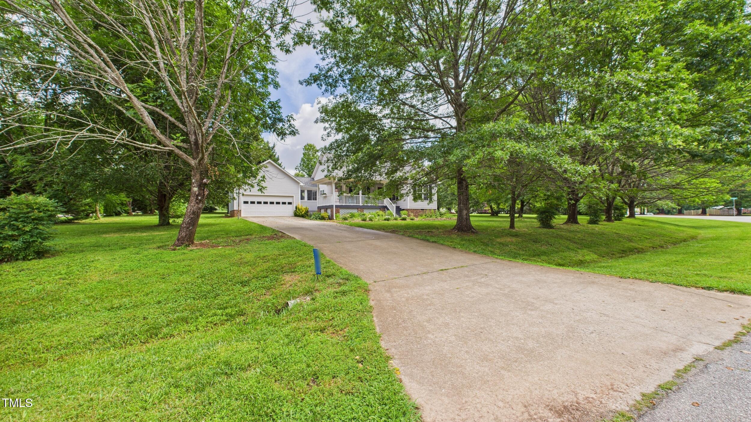 5309 Meadow Field Drive Mebane, NC 27302 - Photo 31 of 41 a view of a park with large trees