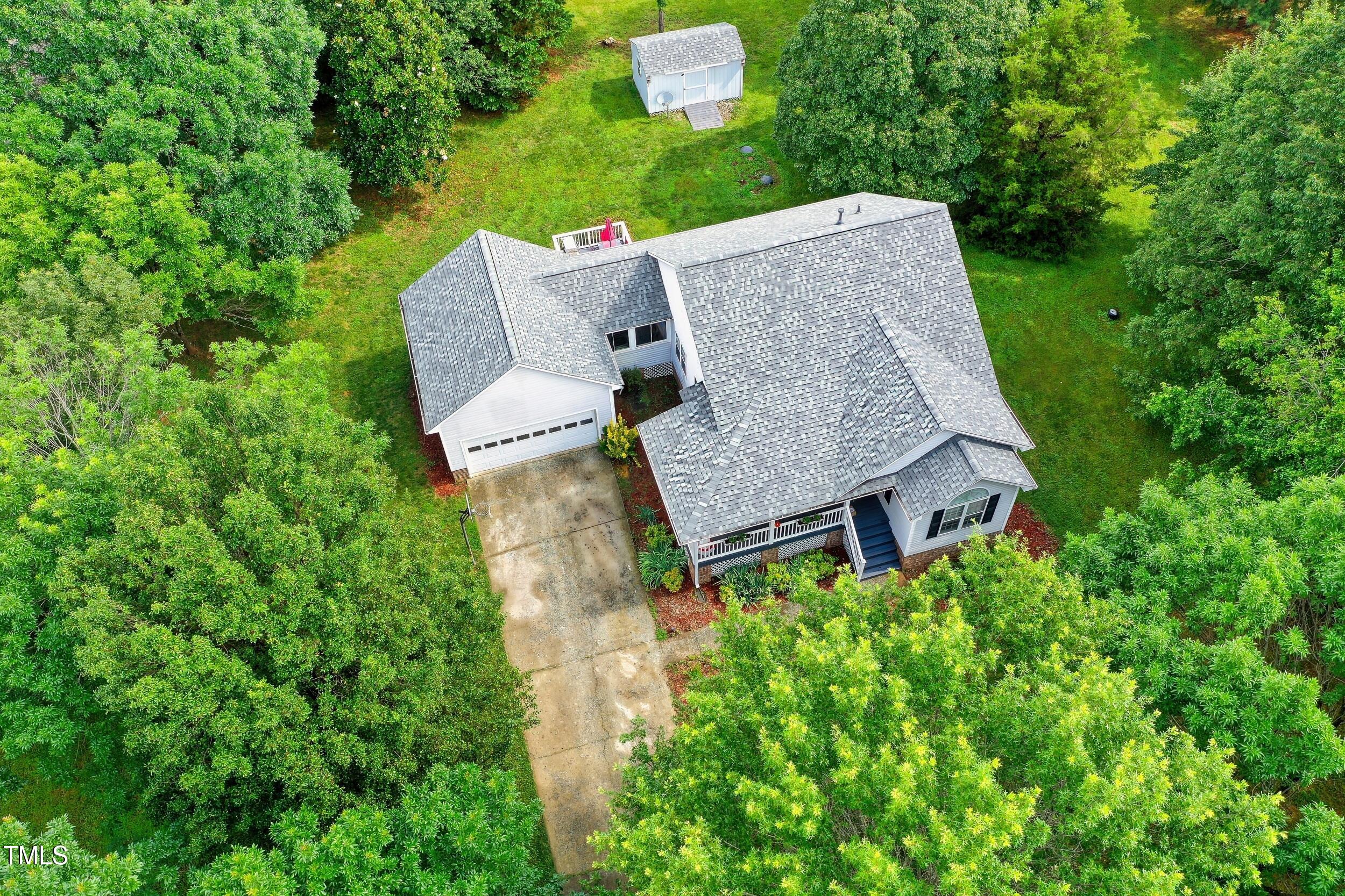 5309 Meadow Field Drive Mebane, NC 27302 - Photo 35 of 41 an aerial view of a house with garden space and street view