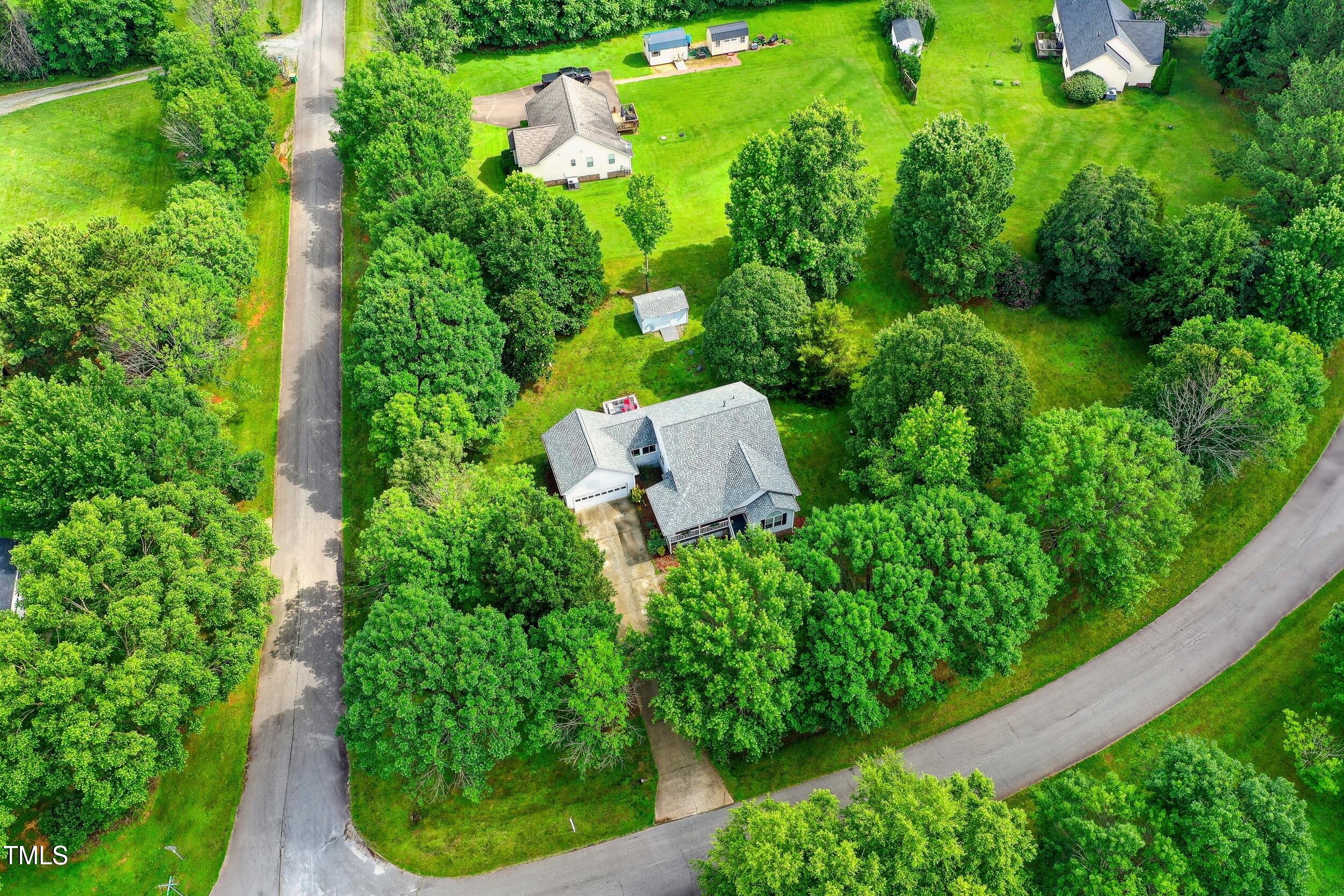 5309 Meadow Field Drive Mebane, NC 27302 - Photo 36 of 41 an aerial view of a house with a yard