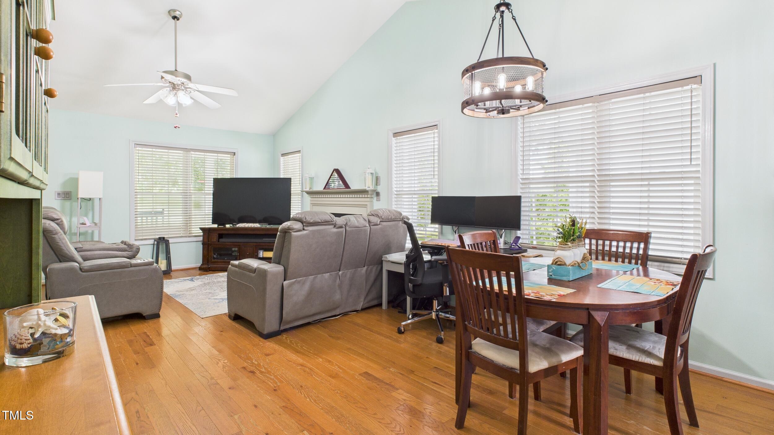5309 Meadow Field Drive Mebane, NC 27302 - Photo 9 of 41 a view of a livingroom with furniture and a flat screen tv