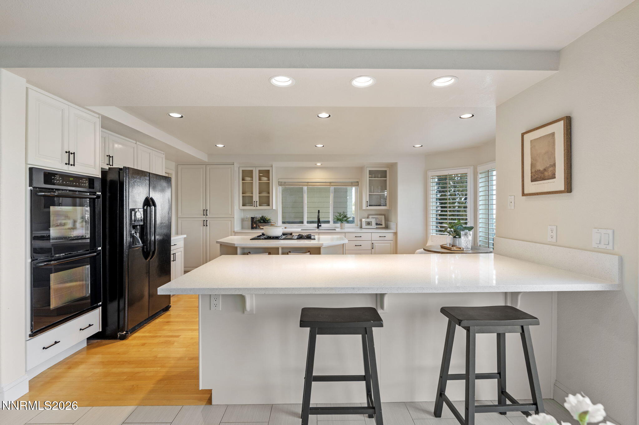 6186 Squires Lane Reno, NV 89519 - Photo 15 of 57 a kitchen with stainless steel appliances a sink and a refrigerator