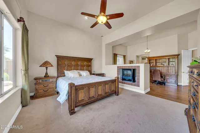 a workspace with furniture window and wooden floor