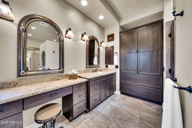 a bathroom with a shower and closet