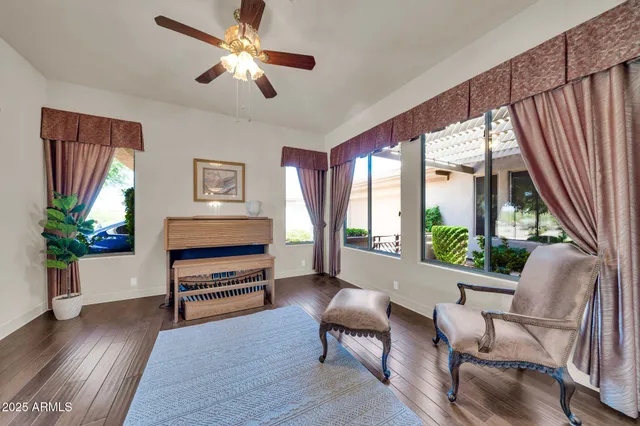 a living room with furniture and a window