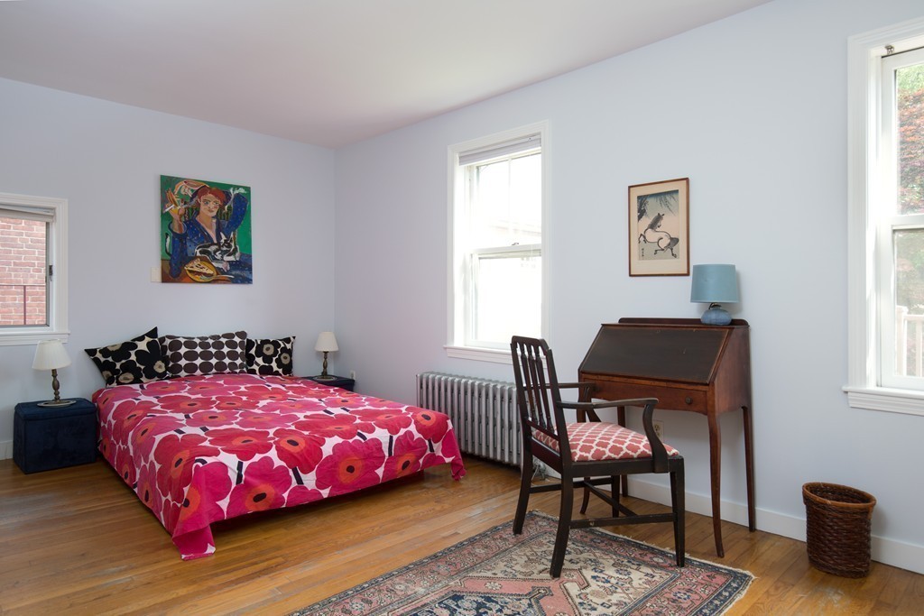 20 Maynard Place Cambridge, MA 02138 - Photo 6 of 10 a bedroom with a bed a chair and a window