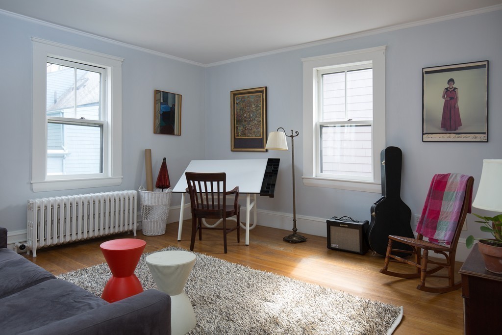20 Maynard Place Cambridge, MA 02138 - Photo 7 of 10 a living room with furniture and a window