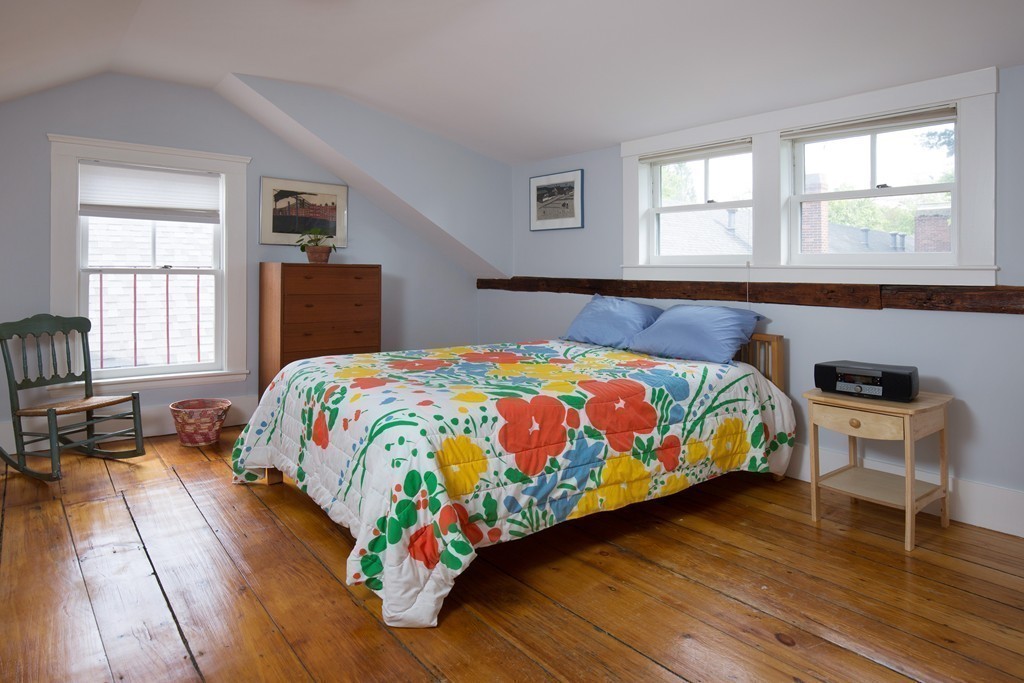 20 Maynard Place Cambridge, MA 02138 - Photo 10 of 10 a bedroom with a bed and wooden floor