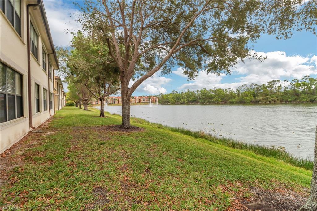 1296 Verde Drive, Unit 3 Naples, FL 34105 - Photo 24 of 31 a view of a lake with houses in outdoor space