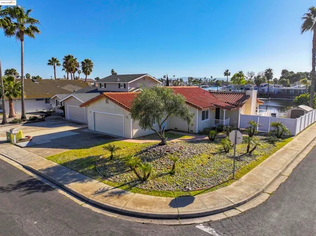 a view of a swimming pool with a lounge chairs