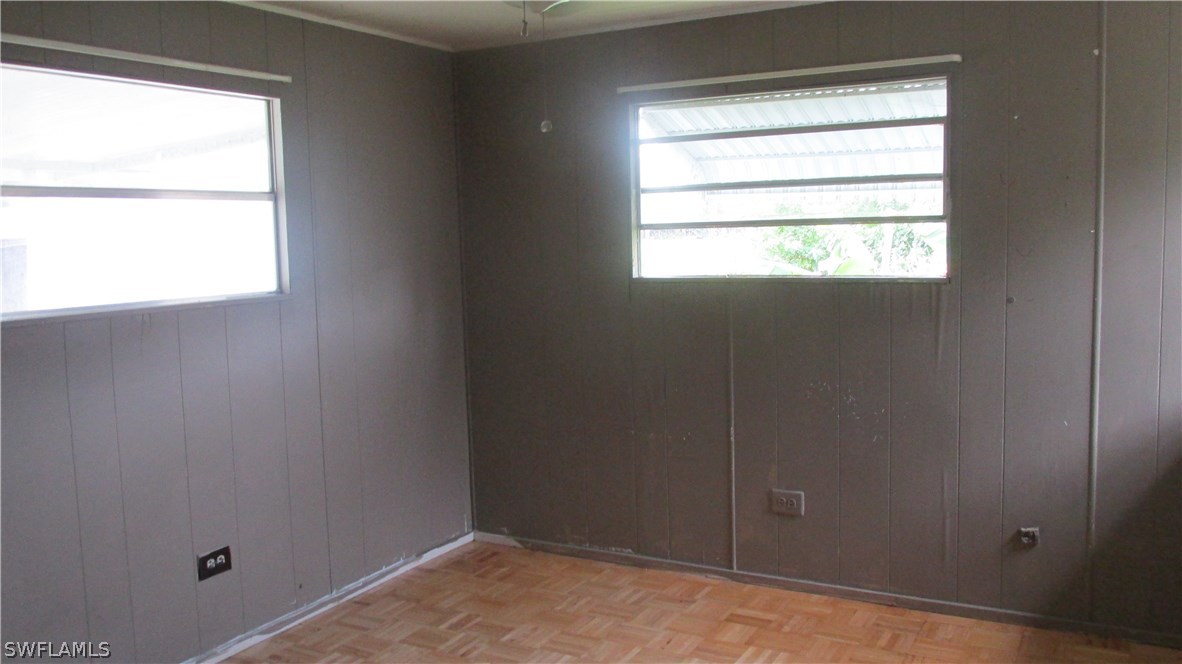 7301 Pinehurst Road Bokeelia, FL 33922 - Photo 8 of 11 a view of an empty room and window