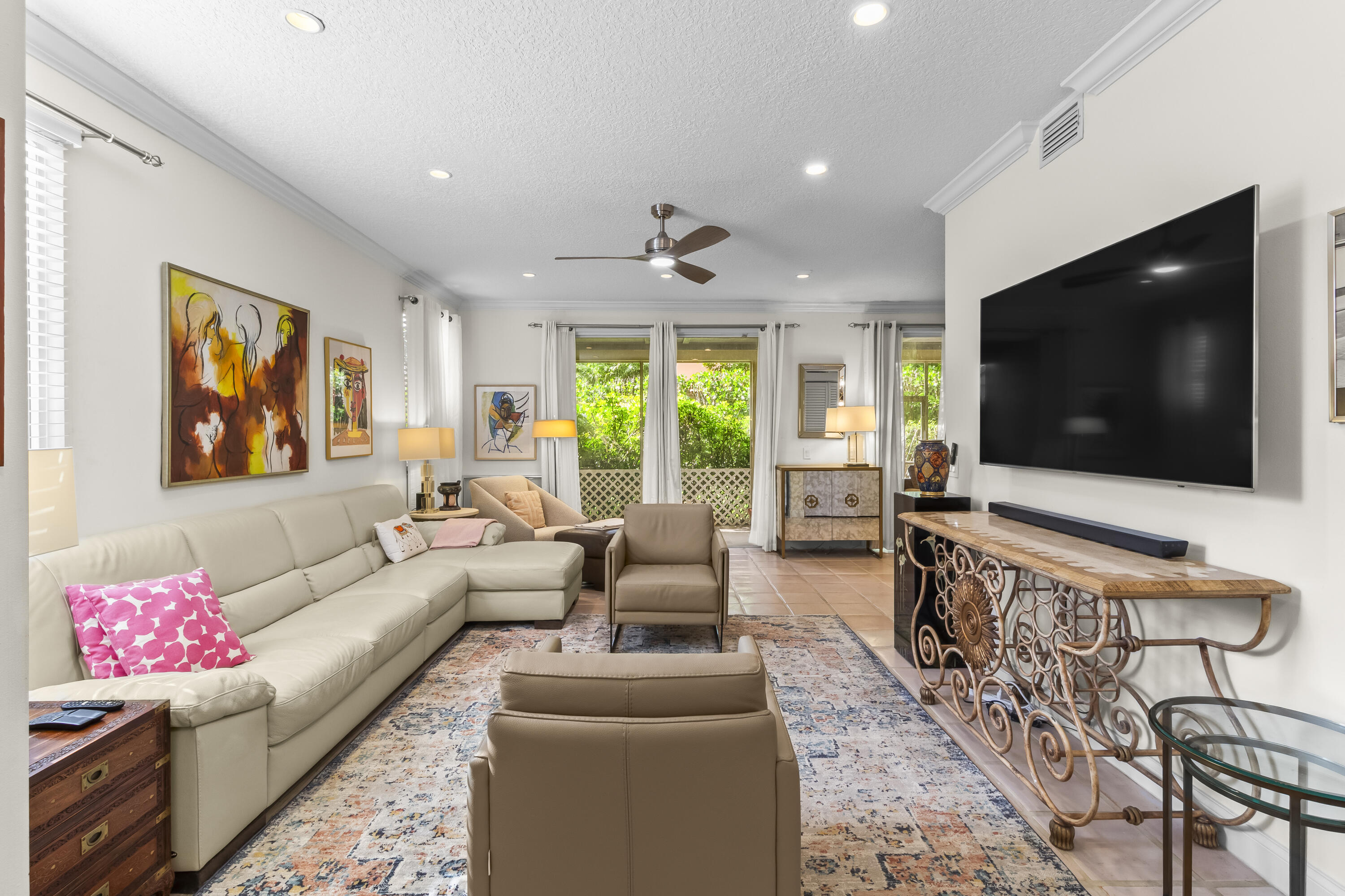 6700 Via Regina Boca Raton, FL 33433 - Photo 7 of 15 a living room with furniture and a flat screen tv