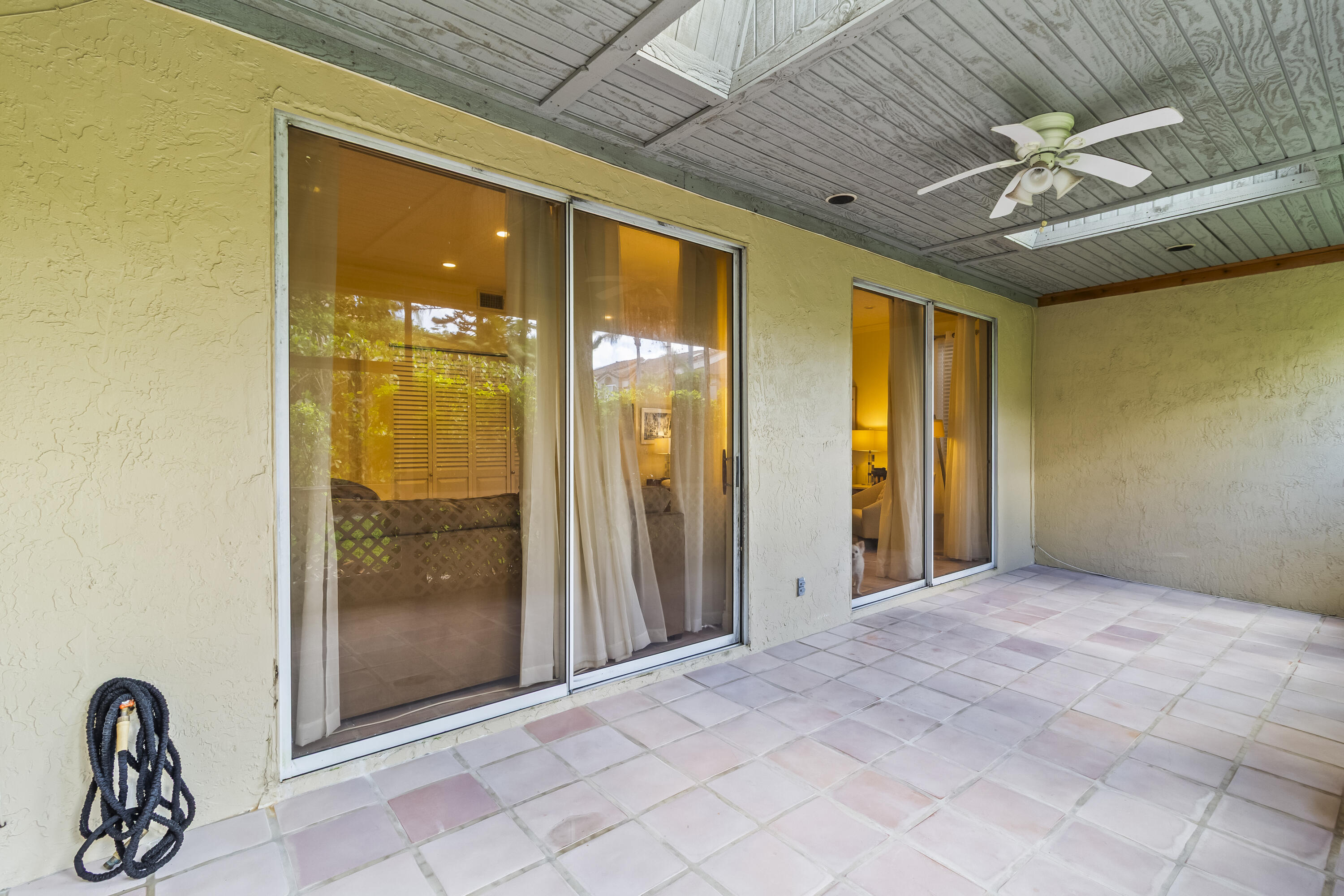 6700 Via Regina Boca Raton, FL 33433 - Photo 9 of 15 a view of a hallway with a chandelier