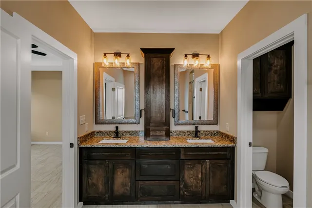 a bathroom with a tub and shower