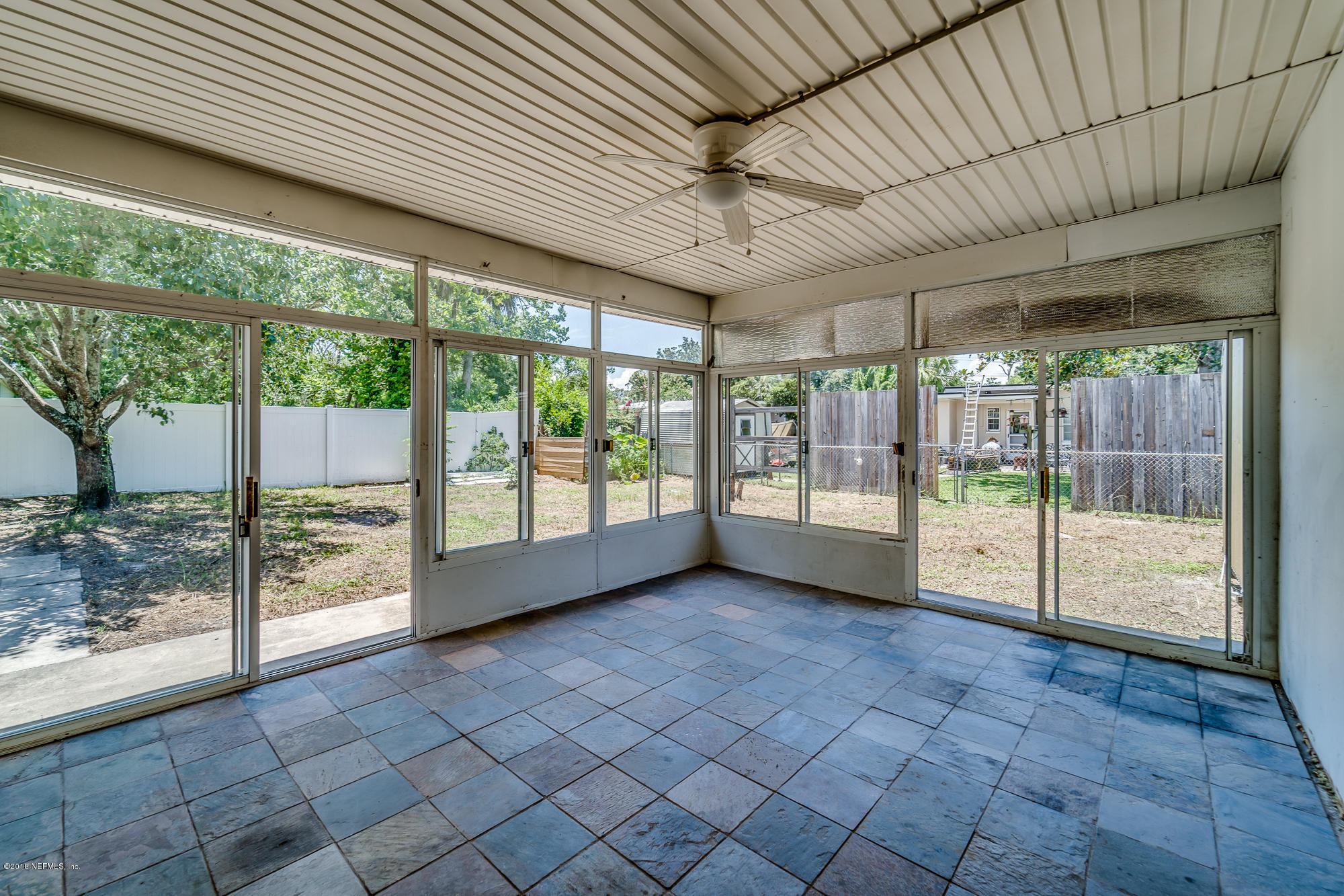 6124 Colgate Road Jacksonville, FL 32217 - Photo 13 of 26 a view of a room with sliding glass door