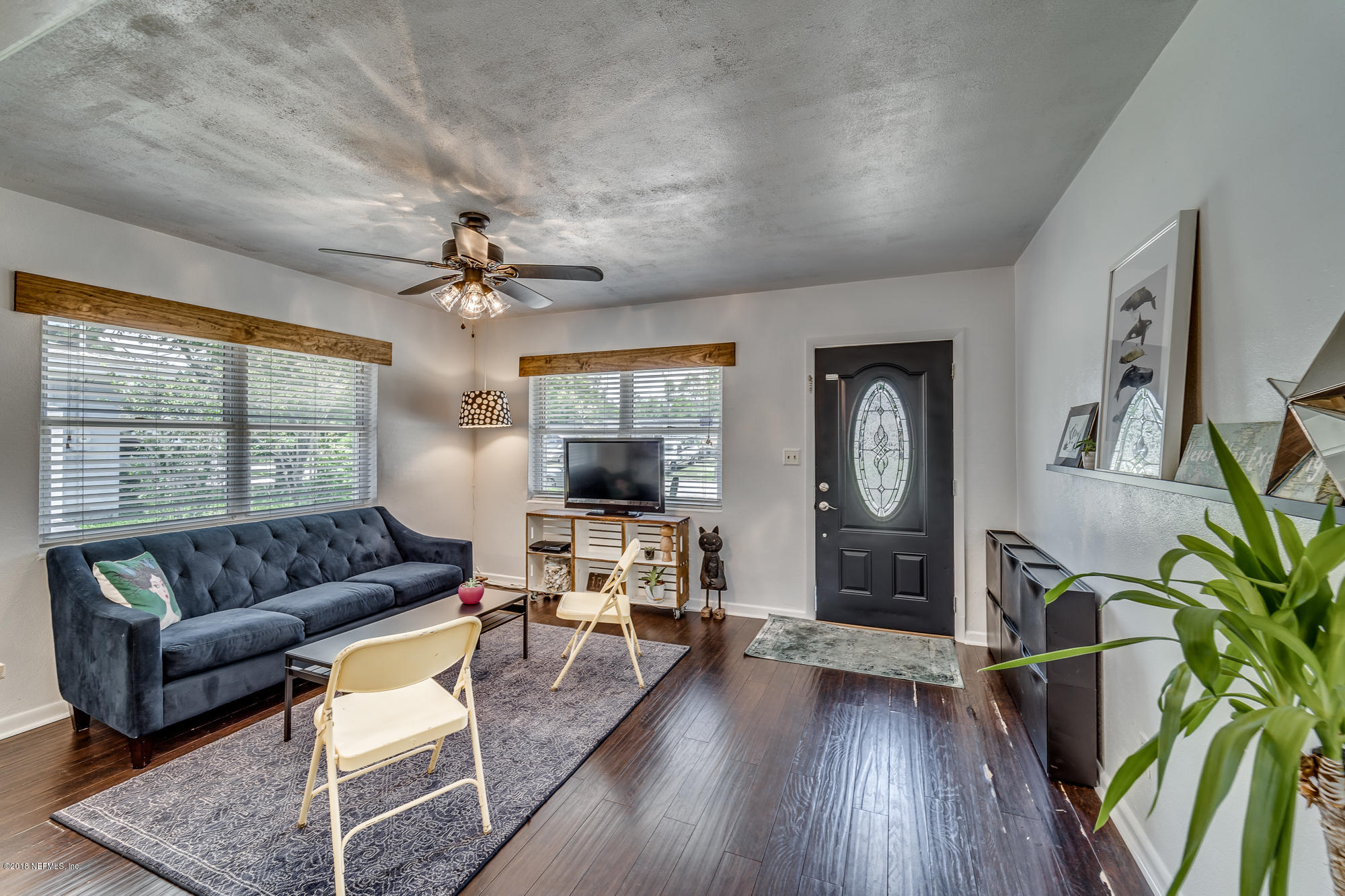 6124 Colgate Road Jacksonville, FL 32217 - Photo 15 of 26 a living room with furniture and a large window