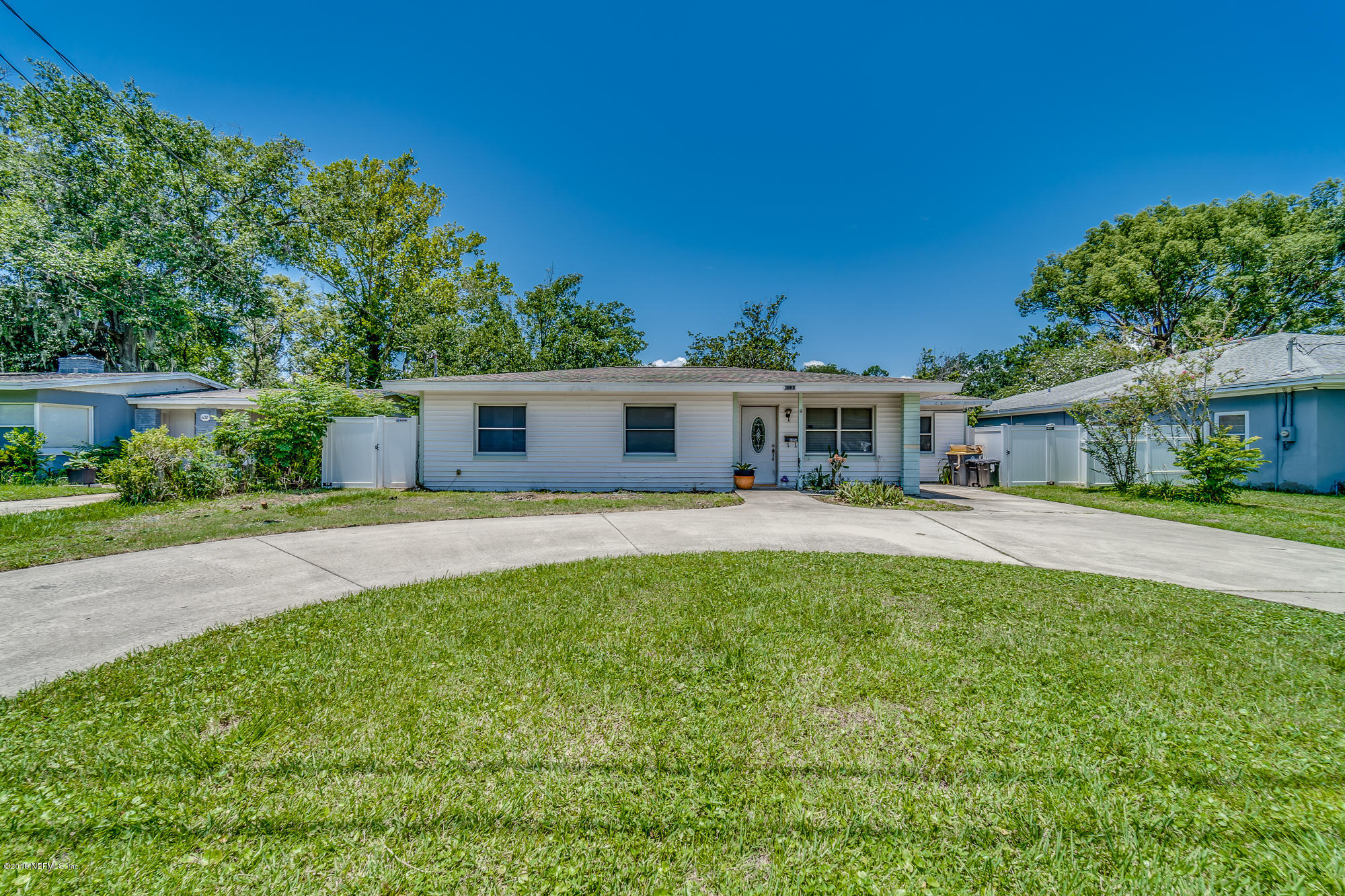 6124 Colgate Road Jacksonville, FL 32217 - Photo 2 of 26 a front view of a house with a yard