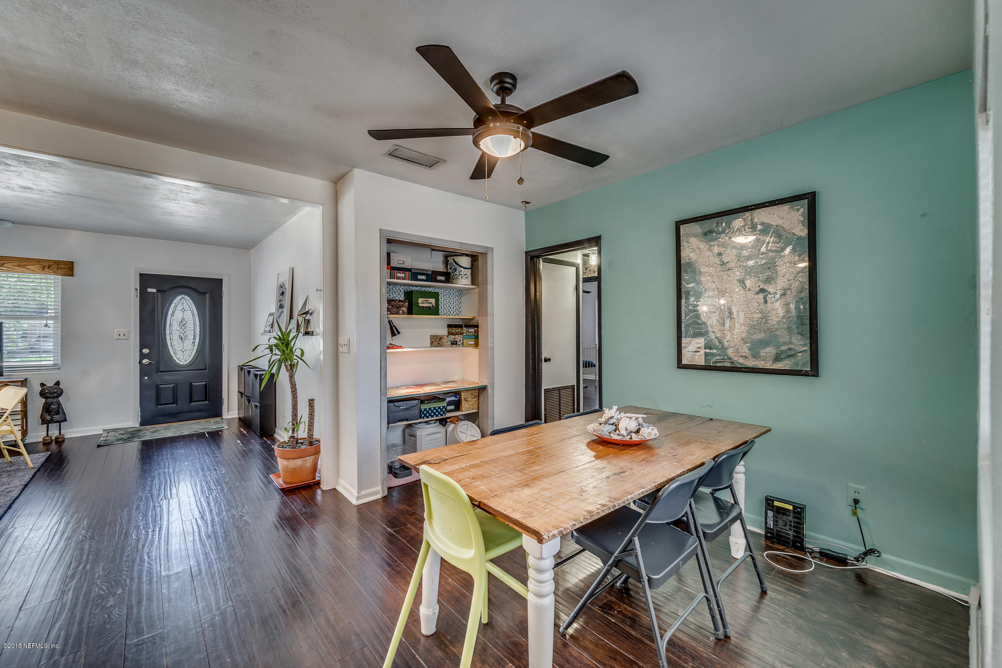 6124 Colgate Road Jacksonville, FL 32217 - Photo 23 of 26 a view of a dining room with furniture and wooden floor