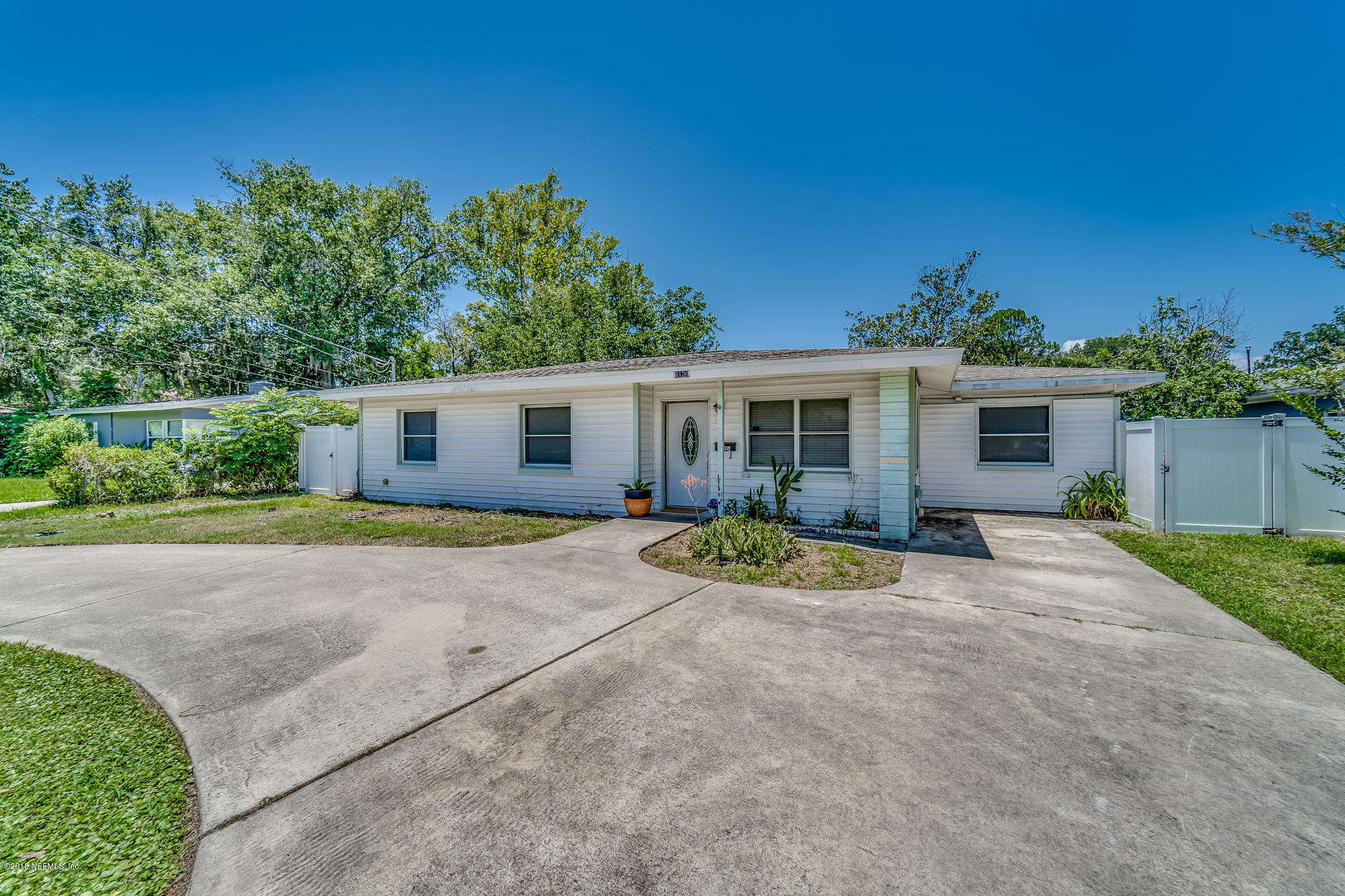 6124 Colgate Road Jacksonville, FL 32217 - Photo 4 of 26 front view of a house with a patio