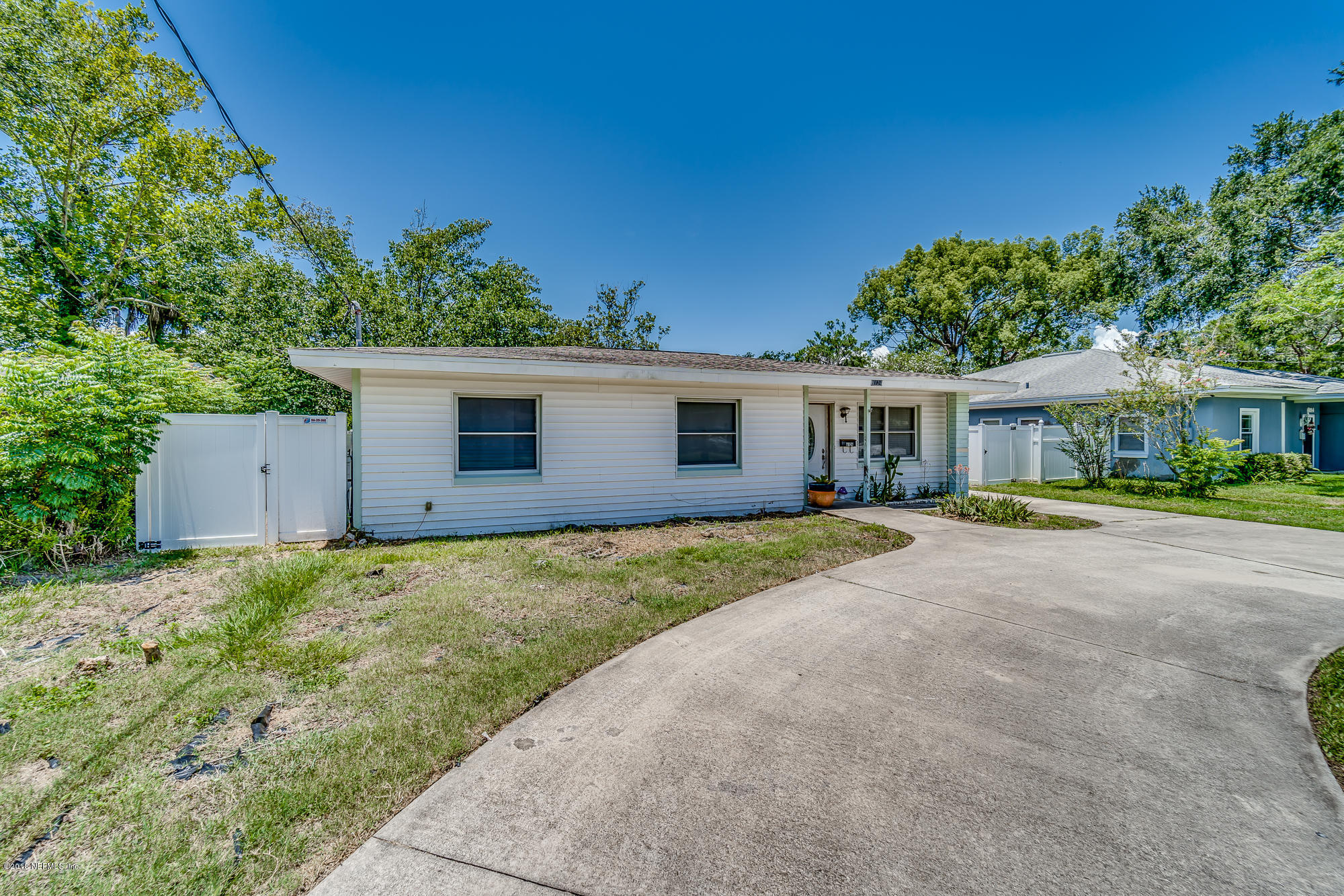 6124 Colgate Road Jacksonville, FL 32217 - Photo 5 of 26 front view of a house with a yard