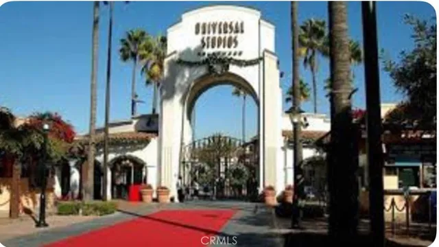 a view of houses with a street