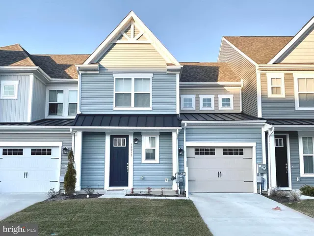 front view of a house and a yard