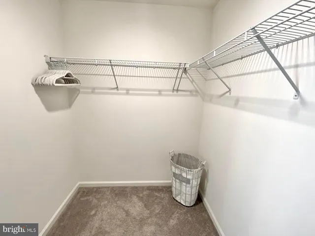 a view of small space with racks on the wall