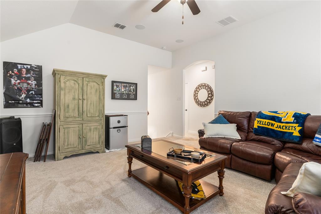 1112 Rhett Drive Colleyville, TX 76034 - Photo 30 of 40 a living room with furniture a rug and a window