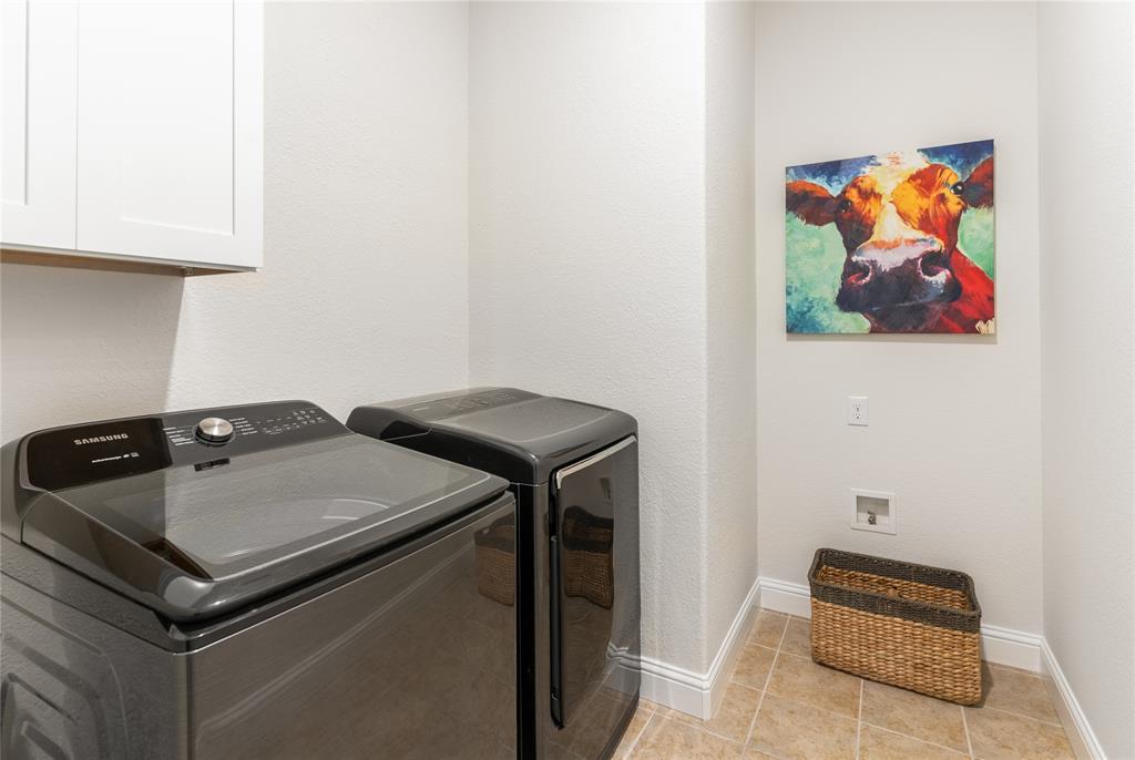 1112 Rhett Drive Colleyville, TX 76034 - Photo 31 of 40 a utility room with dryer and washer