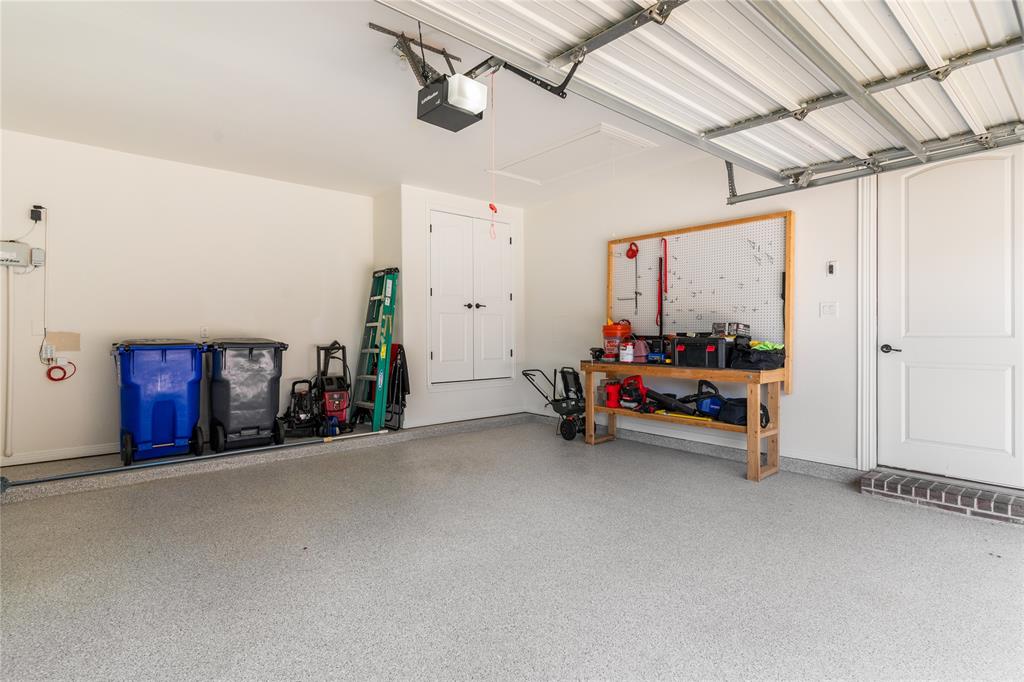 1112 Rhett Drive Colleyville, TX 76034 - Photo 32 of 40 a view of car garage