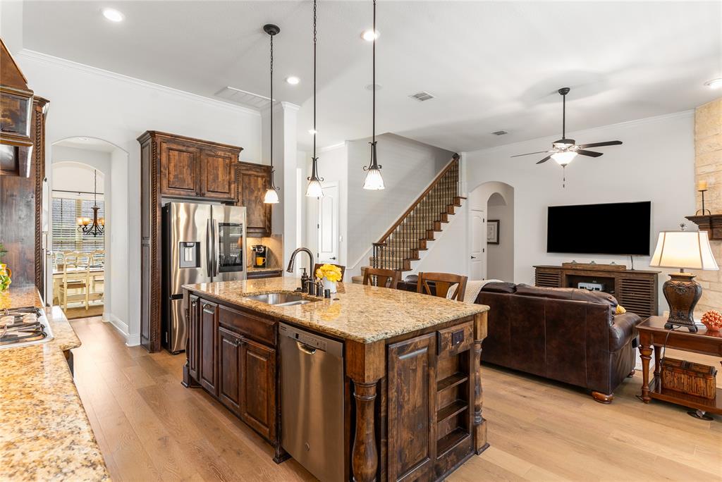 1112 Rhett Drive Colleyville, TX 76034 - Photo 7 of 40 a view of living room with furniture and flat screen tv