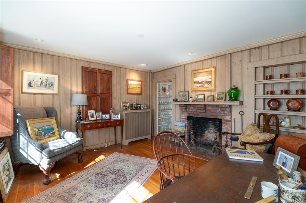 6 Northgate Road Ipswich, MA 01938 - Photo 11 of 42 a living room with furniture and a fireplace