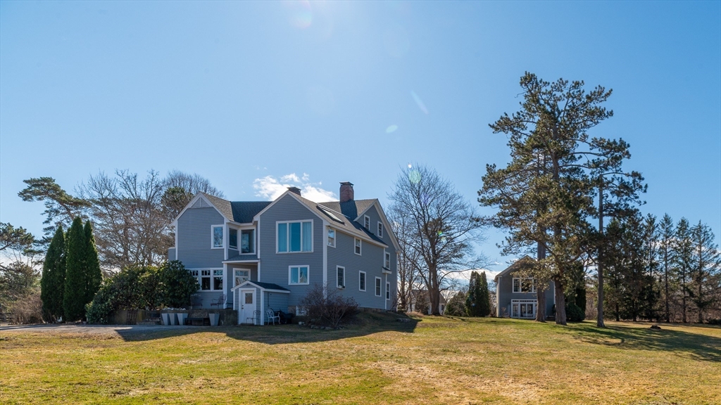 6 Northgate Road Ipswich, MA 01938 - Photo 3 of 42 a view of a large house with a large pool